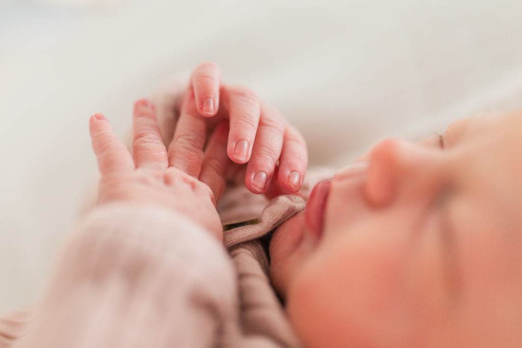 Close-up of newborn's tiny fingers