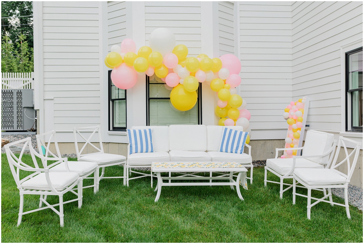 Backyard set up with balloons for birthday party