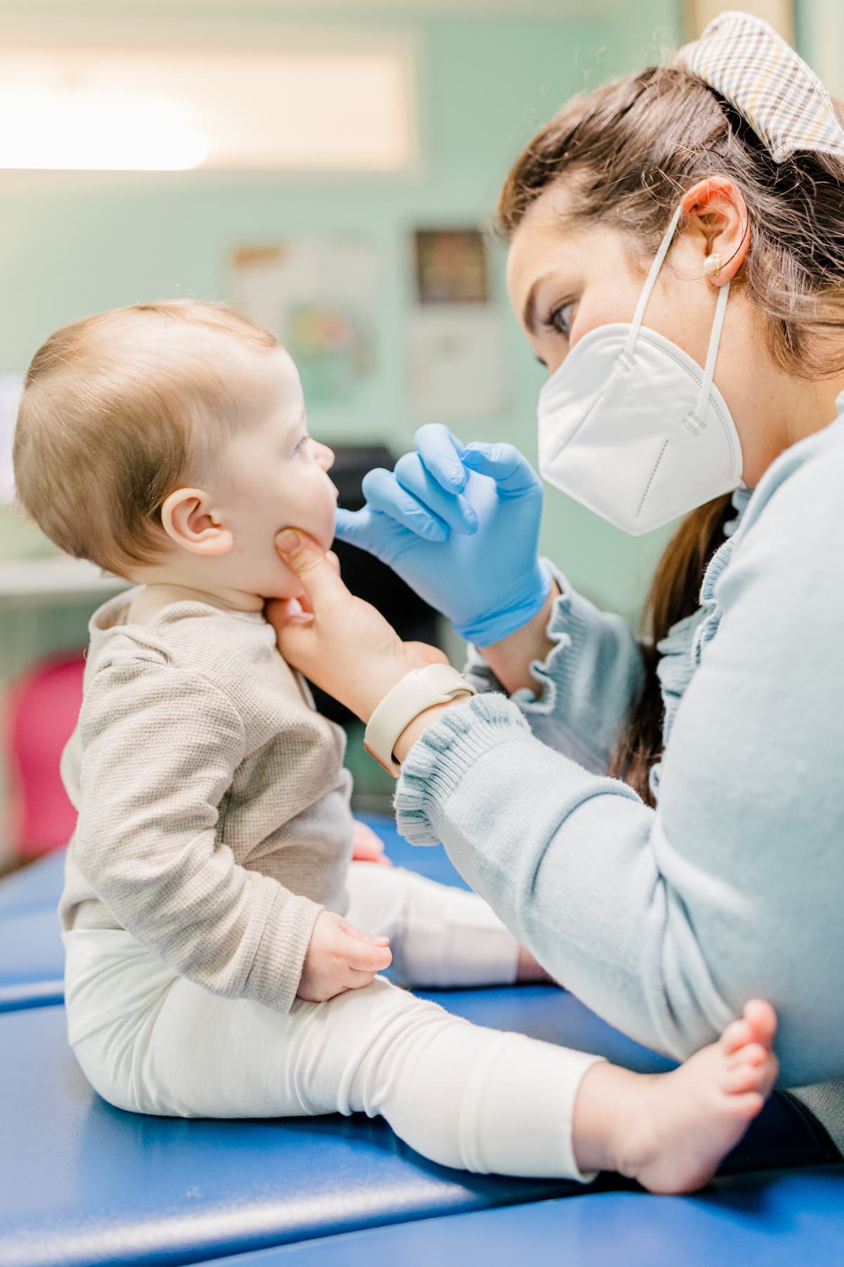Pediatric Chiropractor in Massachusetts adjusting child intraorally
