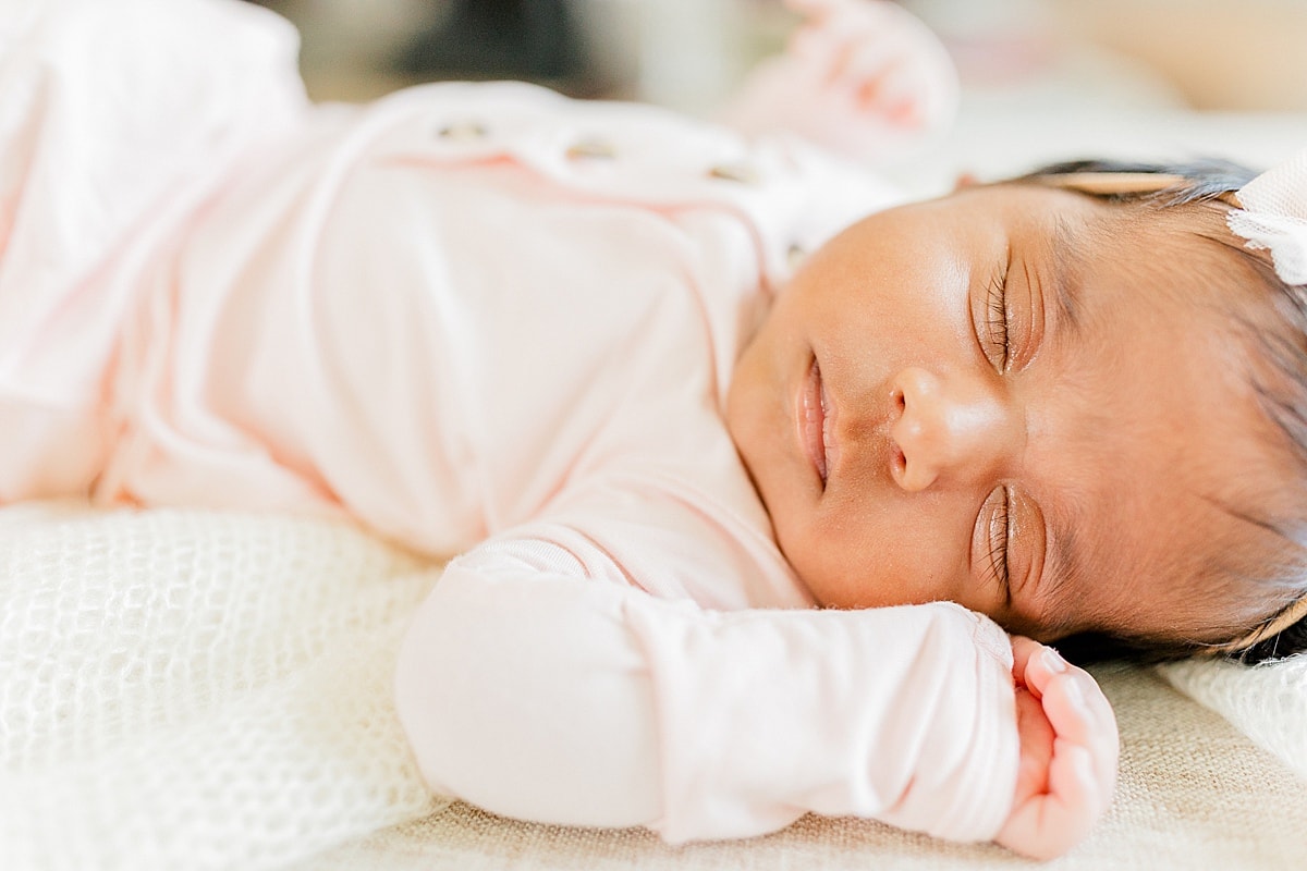 Newborn baby girl sleeping on a blanket Concord OBGYN