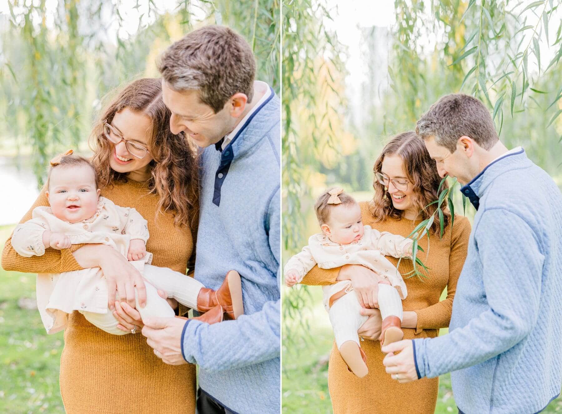 new family of three standing under a willow tree cambridge midwife