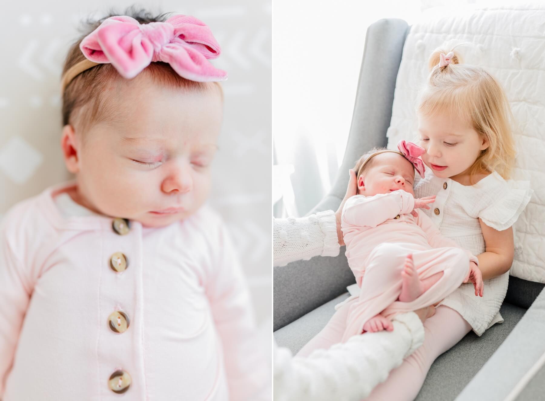 newborn baby sleeps while being handed to her older sister in a studio magpie kids
