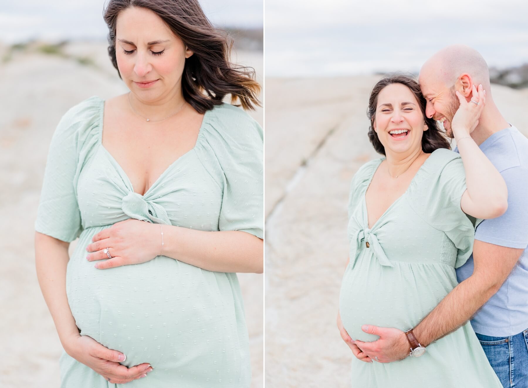 A mother to be stands on a windy beach holding her bump with her husband hugging her from behind obgyn leominster ma